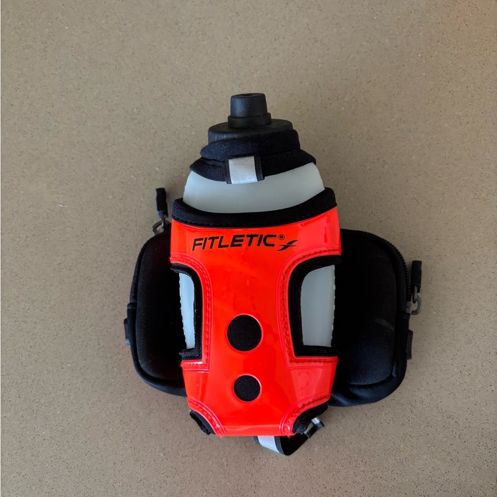 Fitletic HydraPocket Handheld 12 oz Water Bottle Carrier Orange & Black